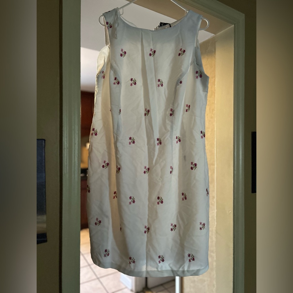 worn dress a little stain on the back that is faded